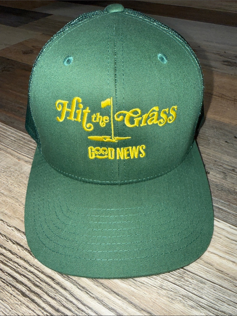 GOOD NEWS Golf “Hit the Grass” Green Yellow Embroidered Trucker Hat